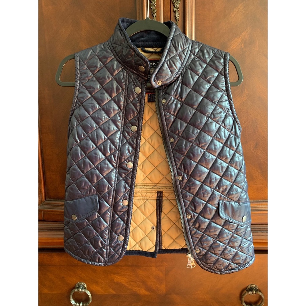 Navy blue quilted vest